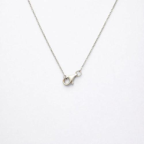 Collier Collier pendentif en or blanc et trois diamants 58 Facettes 35310