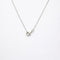 Collier Collier pendentif en or blanc et trois diamants 58 Facettes 35310