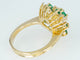 Bague Bague entourage en or jaune 18 ct avec diamants et émeraudes 58 Facettes AX01