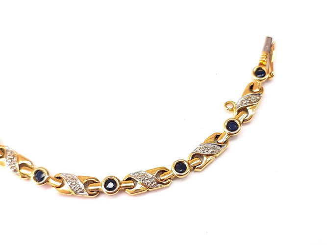 Bracelet Bracelet en or jaune 18K serti de diamants et saphirs 58 Facettes RIV-2129.2