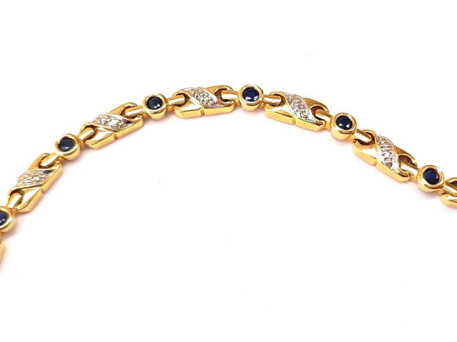 Bracelet Bracelet en or jaune 18K serti de diamants et saphirs 58 Facettes RIV-2129.2