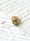 Bague 53 Bague cocktail fleur en or rose 18 ct, péridot et diamants 58 Facettes