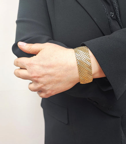 Bracelet Bracelet manchette en or jaune 18 carats 58 Facettes Brac.iris.1974