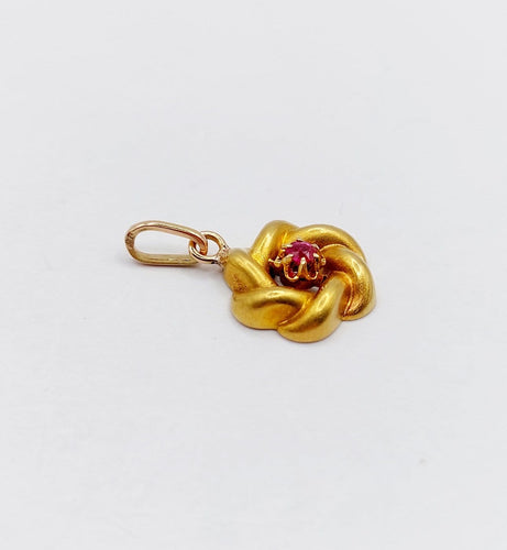 Pendentif Pendentif fleur antique en or jaune 18k et rubis (circa 1920) 58 Facettes A06858