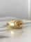 Bague 50 Bague en or jaune 18K sertie d’une citrine cabochon 58 Facettes 250