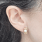 Boucles d'oreilles Boucles d'oreilles - Perles et or jaune 18 k 58 Facettes PE112