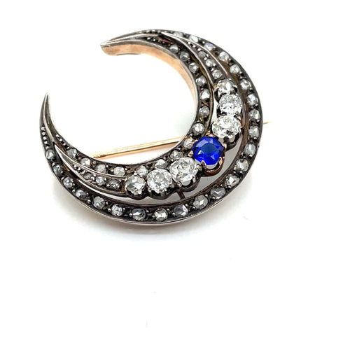Broche Broche croissant de lune - Diamants et saphir de synthèse en or rose 58 Facettes 00344