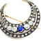 Broche Broche croissant de lune - Diamants et saphir de synthèse en or rose 58 Facettes 00344
