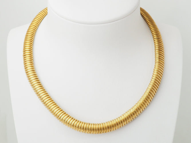 Collier Collier tubogas vintage en or jaune 18 carats 58 Facettes 33719