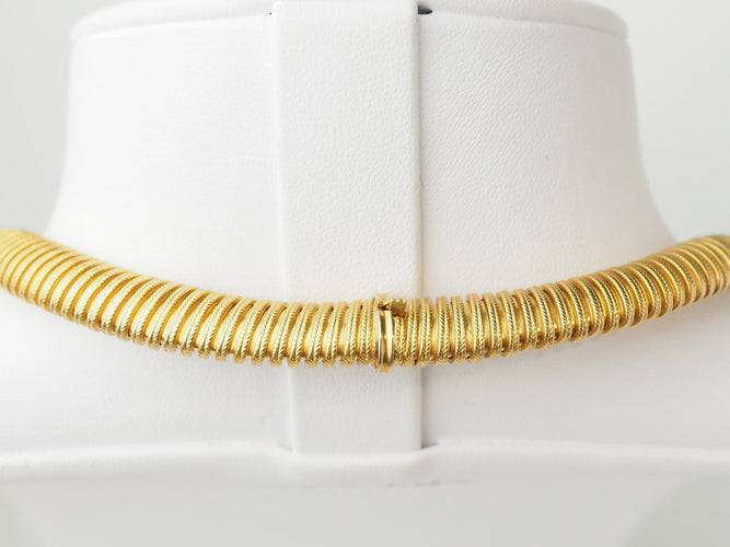 Collier Collier tubogas vintage en or jaune 18 carats 58 Facettes 33719