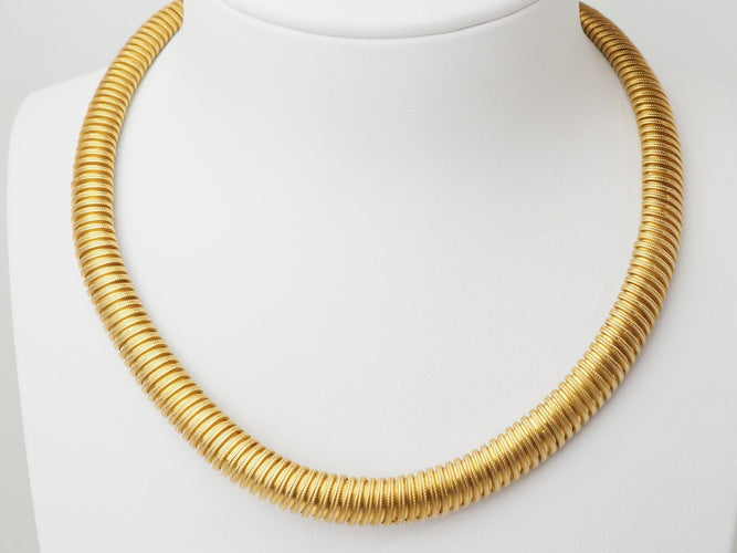 Collier Collier tubogas vintage en or jaune 18 carats 58 Facettes 33719