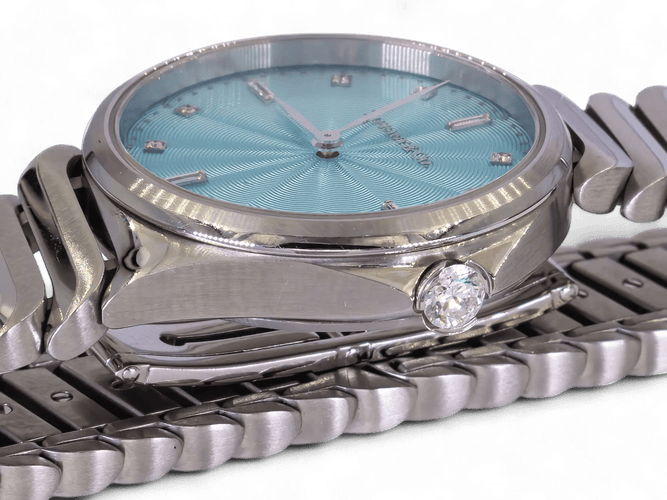 Montre Tiffany & Co Metro - Montre en acier avec diamants, cadran bleu ondulé 58 Facettes TCOW