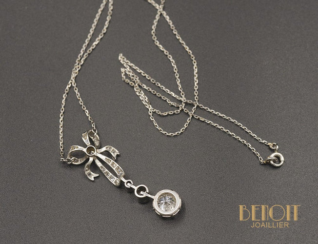Pendentif Pendentif nœud en platine et diamants 58 Facettes A10282