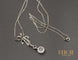 Pendentif Pendentif nœud en platine et diamants 58 Facettes A10282