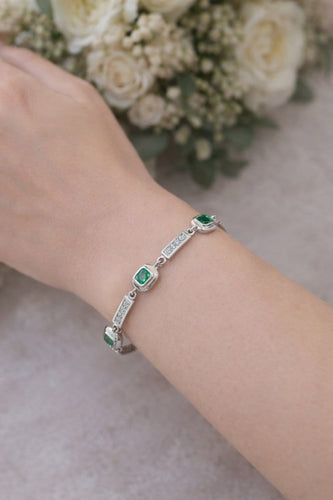Bracelet Bracelet en or blanc 18 carats avec diamants et émeraudes colombiennes 58 Facettes 50399