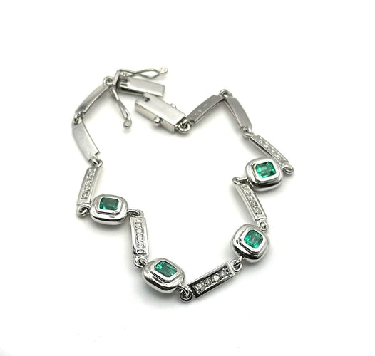 Bracelet Bracelet en or blanc 18 carats avec diamants et émeraudes colombiennes 58 Facettes 50399