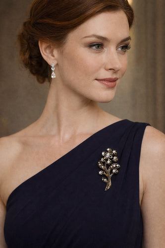 Broche Broche florale espagnole en argent et or aux diamants taille rose 58 Facettes 50289
