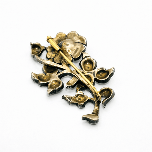 Broche Broche florale espagnole en argent et or aux diamants taille rose 58 Facettes 50289