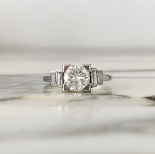 Bague 57 Bague Art déco en platine et diamants 58 Facettes 252