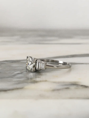 Bague 57 Bague Art déco en platine et diamants 58 Facettes 252