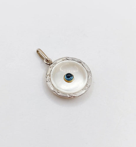 Pendentif Pendentif cible Art déco en or 18k, platine, nacre et saphir synthétique 58 Facettes A06911