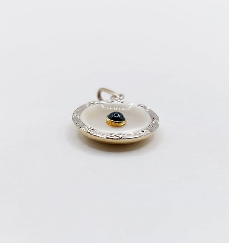 Pendentif Pendentif cible Art déco en or 18k et platine, nacre et saphir 58 Facettes A06912
