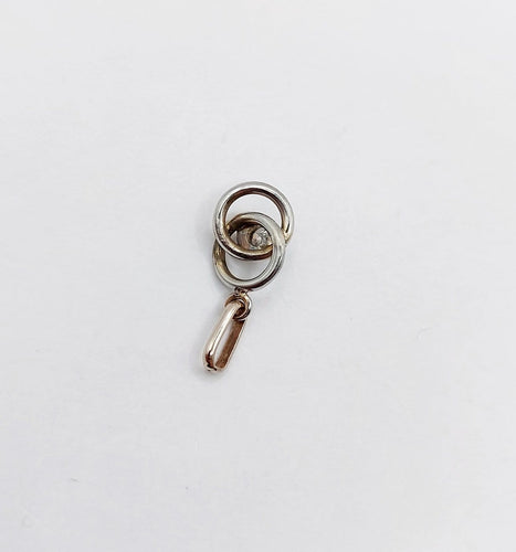 Pendentif Pendentif antique nœud infini en or blanc 18k et diamant (circa 1920) 58 Facettes A06948