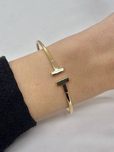Bracelet Tiffany & Co Tiffany T Wire - Bracelet en or jaune 18K 58 Facettes 1817