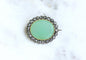 Broche Broche ancienne chrysoprase et diamants en or rose et argent 58 Facettes