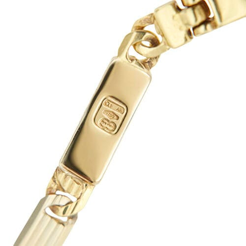 Bracelet Unoaerre - Bracelet maille œil de tigre en or jaune et or blanc 58 Facettes 35766