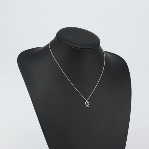 Collier Tiffany & Co. Paloma Picasso Loving Heart - Collier pendentif en argent 925 58 Facettes o66415wlof
