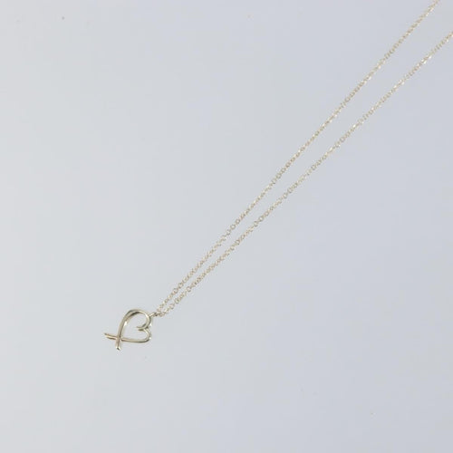 Collier Tiffany & Co. Paloma Picasso Loving Heart - Collier pendentif en argent 925 58 Facettes o66415wlof