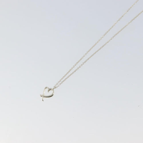 Collier Tiffany & Co. Paloma Picasso Loving Heart - Collier pendentif en argent 925 58 Facettes o66415wlof
