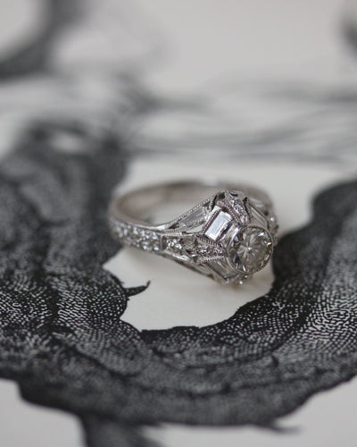 Bague 54 Bague solitaire Art déco en or blanc et diamants 58 Facettes A11351