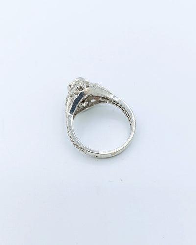 Bague 54 Bague solitaire Art déco en or blanc et diamants 58 Facettes A11351