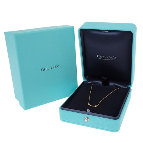 Collier Tiffany & Co. T Smile - Collier pendentif en or jaune 18k et diamants 58 Facettes h7ew21j6cx