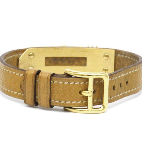 Hermès Kelly - Montre quartz en métal plaqué or et cuir