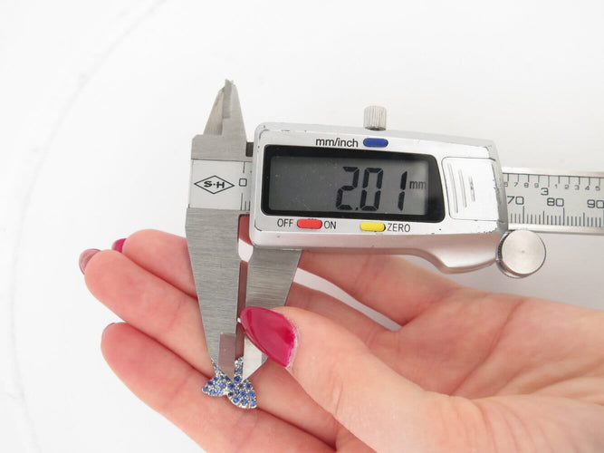 Boucles d'oreilles Mauboussin Tu es la sublime fleur de ma vie - Boucles d’oreilles en or blanc 18k et saphir 58 Facettes 274234