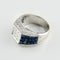 Bague cocktail en or blanc 750 avec saphirs et diamants taille princesse 58 Facettes 1710