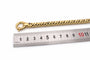 Bracelet Bracelet gourmette en or jaune 18 carats et saphir 58 Facettes Bracelet en or jaune 18 carats et saphir