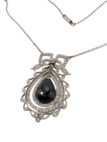 Pendentif Pendentif nœud Belle Époque, saphir briolette et diamants 58 Facettes Collier O2366