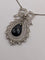 Pendentif Pendentif nœud Belle Époque, saphir briolette et diamants 58 Facettes Collier O2366