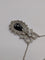Pendentif Pendentif nœud Belle Époque, saphir briolette et diamants 58 Facettes Collier O2366