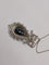 Pendentif Pendentif nœud Belle Époque, saphir briolette et diamants 58 Facettes Collier O2366