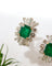 Boucles d'oreilles Boucles d'oreilles cocktail 1950 en or jaune, or blanc et platine, émeraudes et diamants 58 Facettes A11963