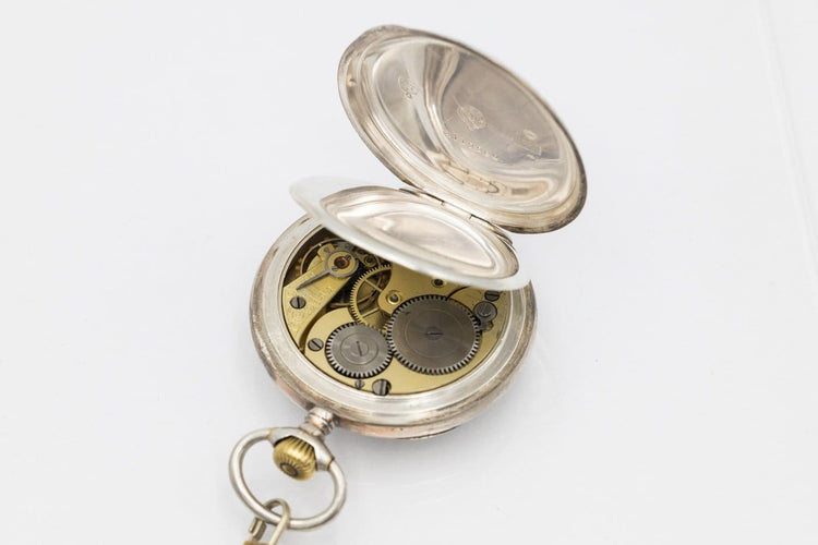 Montre OMEGA - Montre de poche gravée, 1912 58 Facettes ANK01