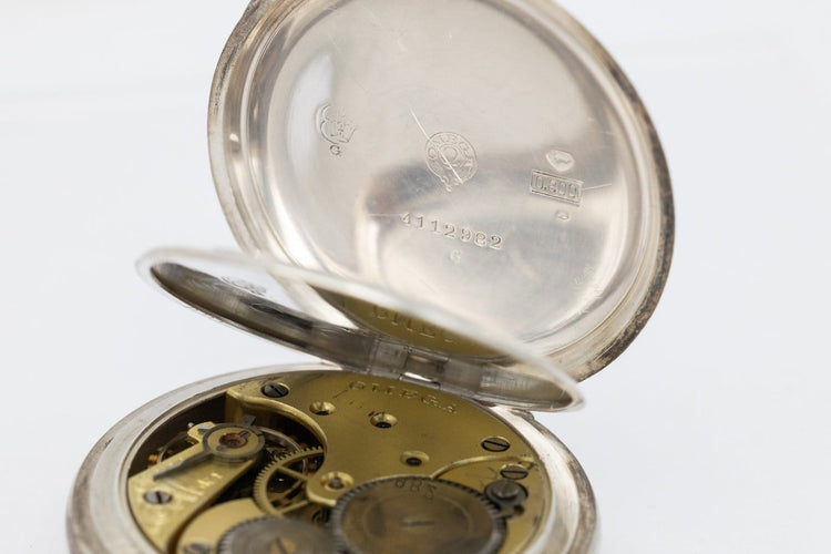 Montre OMEGA - Montre de poche gravée, 1912 58 Facettes ANK01