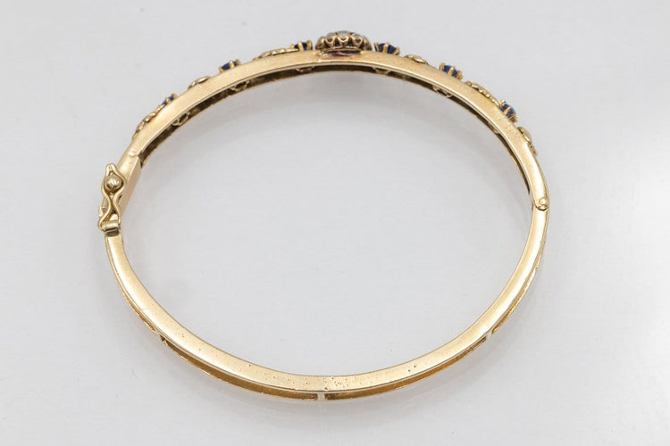 Bracelet Bracelet rigide - Bracelet en or jaune et saphirs, diamants 58 Facettes 11999