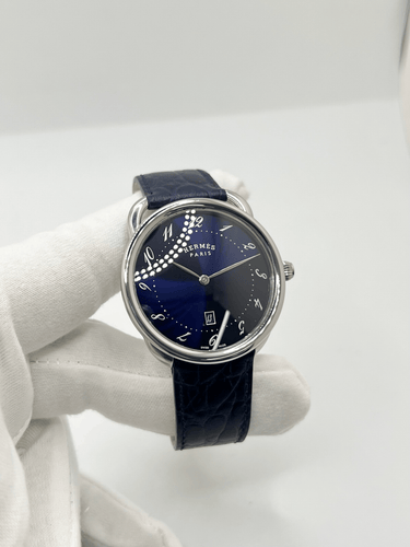 Montre Hermès Arceau Grand Modèle - Montre en acier 40 mm quartz 58 Facettes 1770