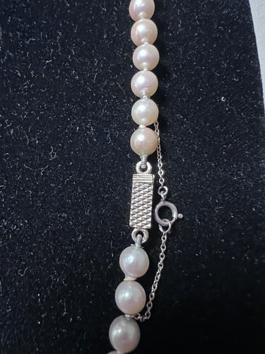 Collier Collier Akoya - 65 perles de culture avec fermoir en or blanc 750 58 Facettes 909